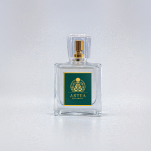 Elegant Antua Perfumeria fragrance bottle with green label and gold floral design.